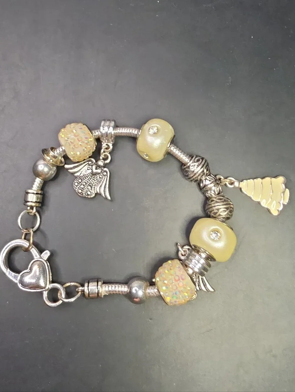 Silver Charm Bracelet with Cream Beads and Gold Accents